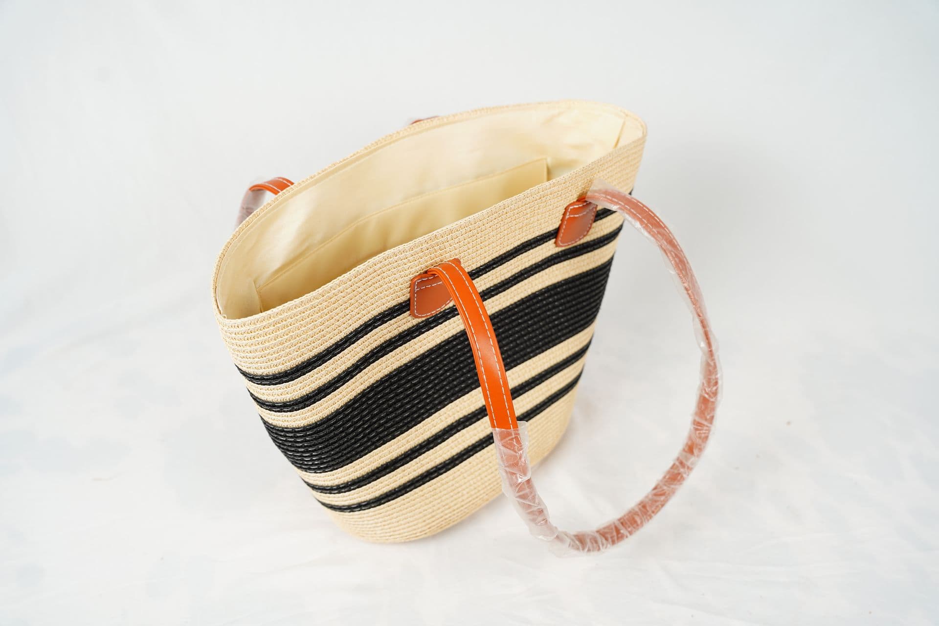 Striped basket with long handles